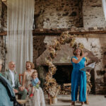 A couple laugh as Amy Lee tells their story